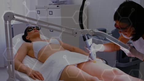 Animation-of-chemical-formulas-over-diverse-female-patient-and-doctor-during-laser-treatment