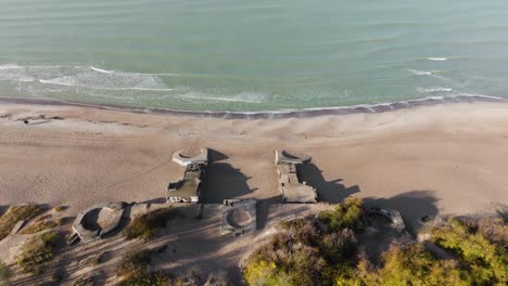 Aerial-view-the-remains-of-a-World-War-II-defensive-bunker-that-was-built-on-the-shore-of-the-Baltic-Sea-near-the-city-of-Klaipeda