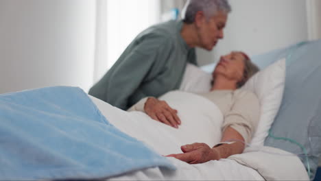 Elderly-women,-hospital-and-kiss-on-forehead