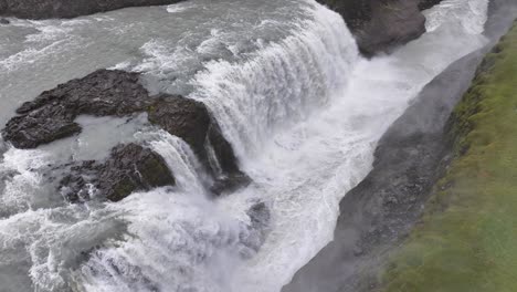 Aerial-View-of-Gullfoss-Waterfall-and-Glacial-Water-of-Hvita-River,-Iceland