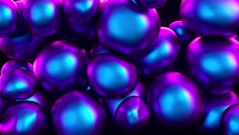 abstract colorful squishy balls move and interact with each other with internal pressure trying to find a place for themselves. modern ultraviolet color spectrum light.