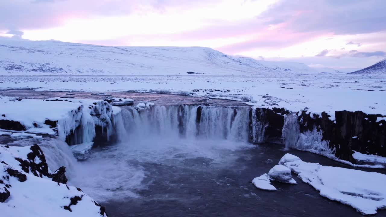 Frozen Waterfall in Winter Landscape