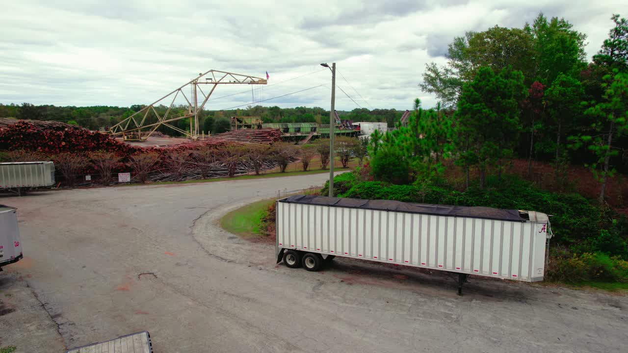Industrial chip mill Brent, Alabama with timber stacks and machinery
