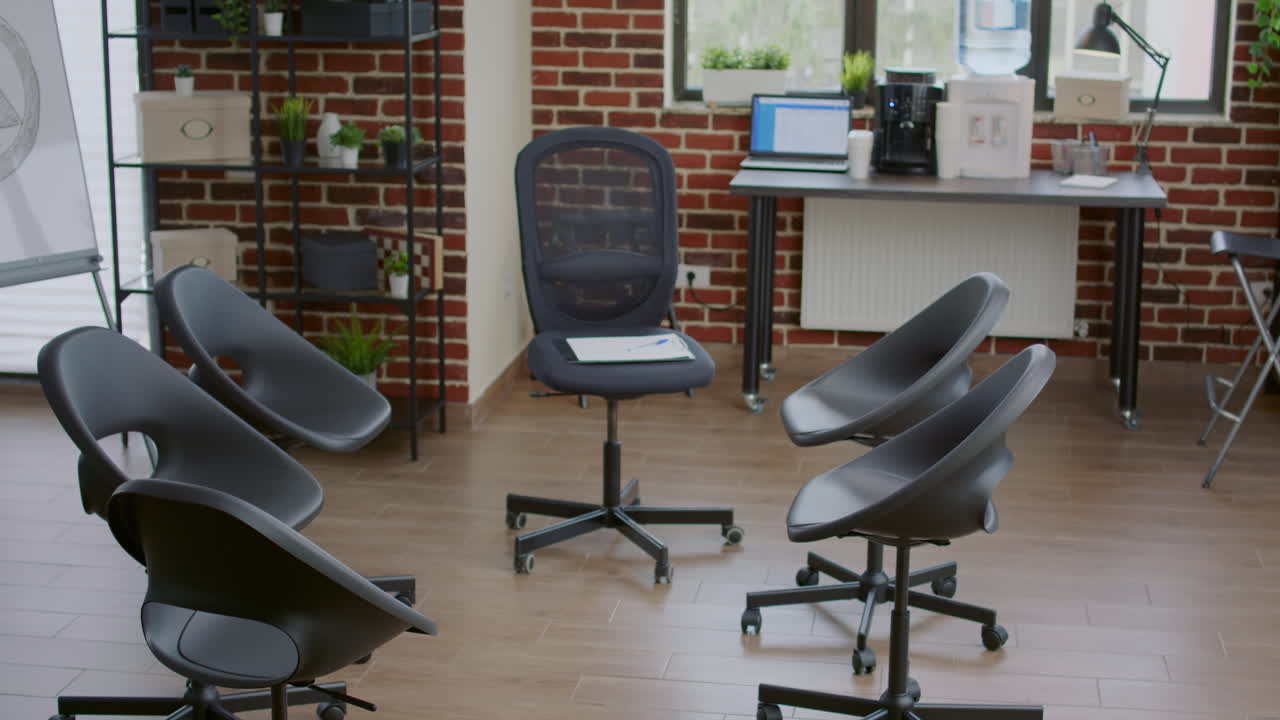 Empty room for aa support meeting with chairs in circle at group therapy session