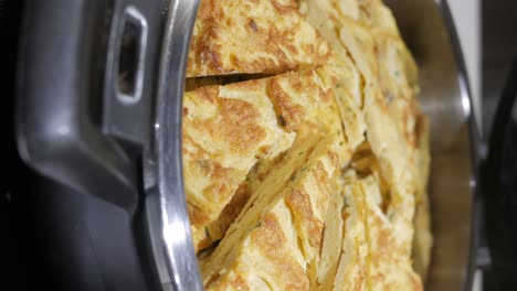 close-up of an omelet in a buffet tray