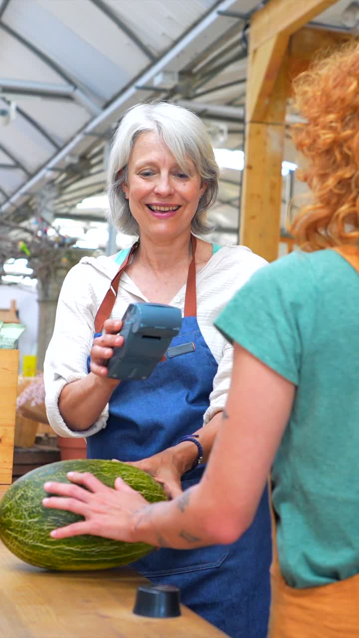A woman selling melon to a customer