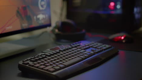 close up of professional rgb keypad in empty gaming room