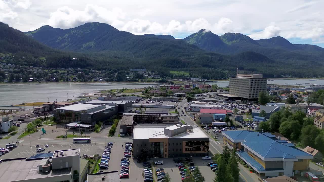 aerial push in to juneau alaksa with inside passage in background