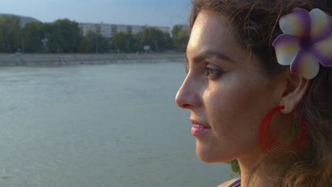 Close-Up-Profile-of-Young-Satisfied-Woman-Opening-Her-Eyes-During-Meditation-and-Sunset-Watching,-Slow-Motion