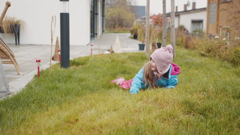 child playing outdoors in autumn