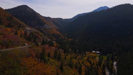 Car-driving-through-canyon-in-the-distance