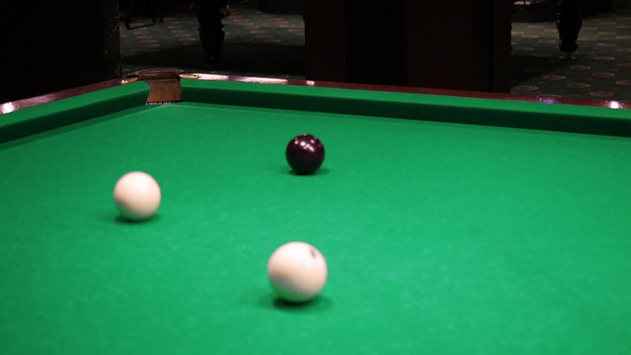 Juego de billar en progreso