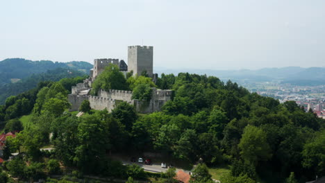 aerial view of a medieval castle in the mountains