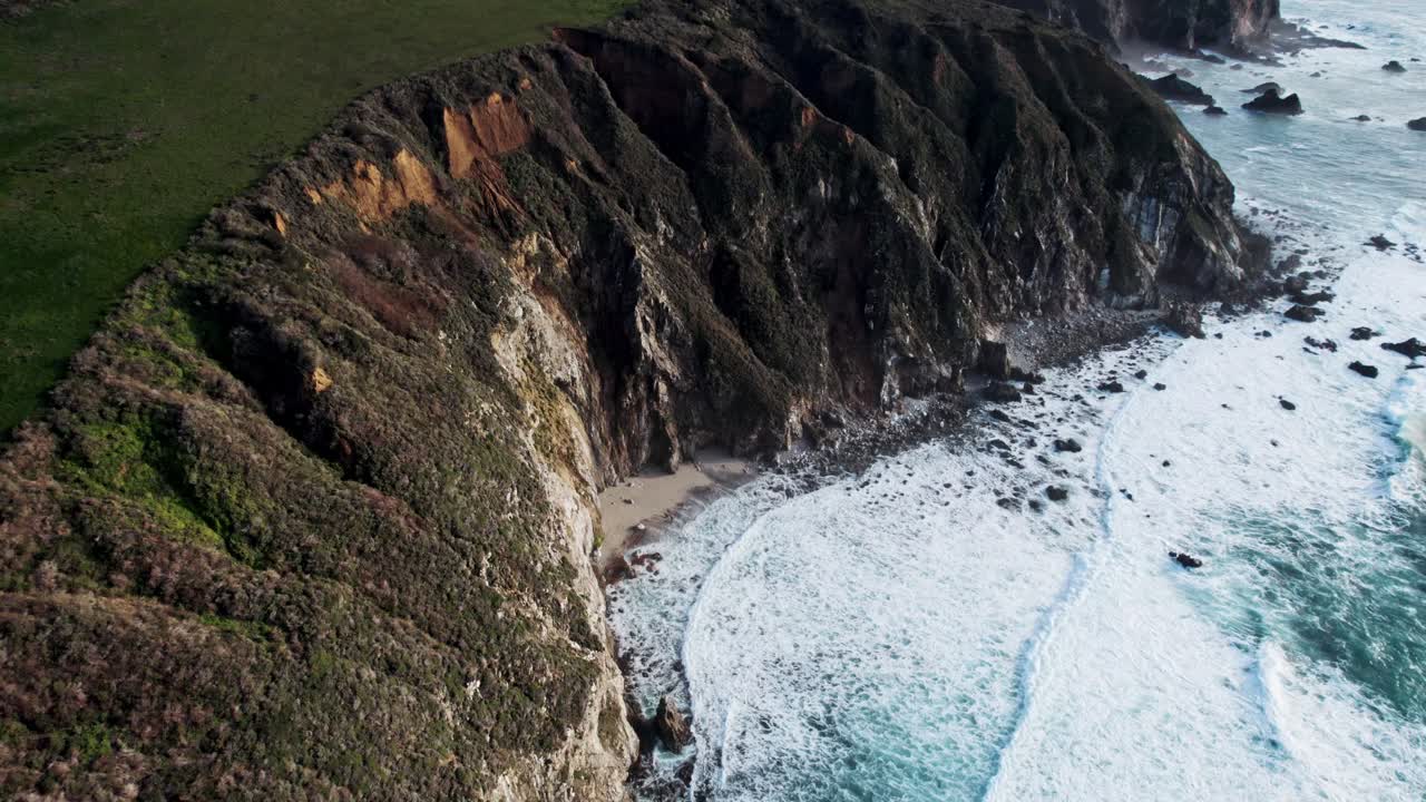 Dramatic Ocean Cliffs on the West Coast with Waves Crashing Against Rocks