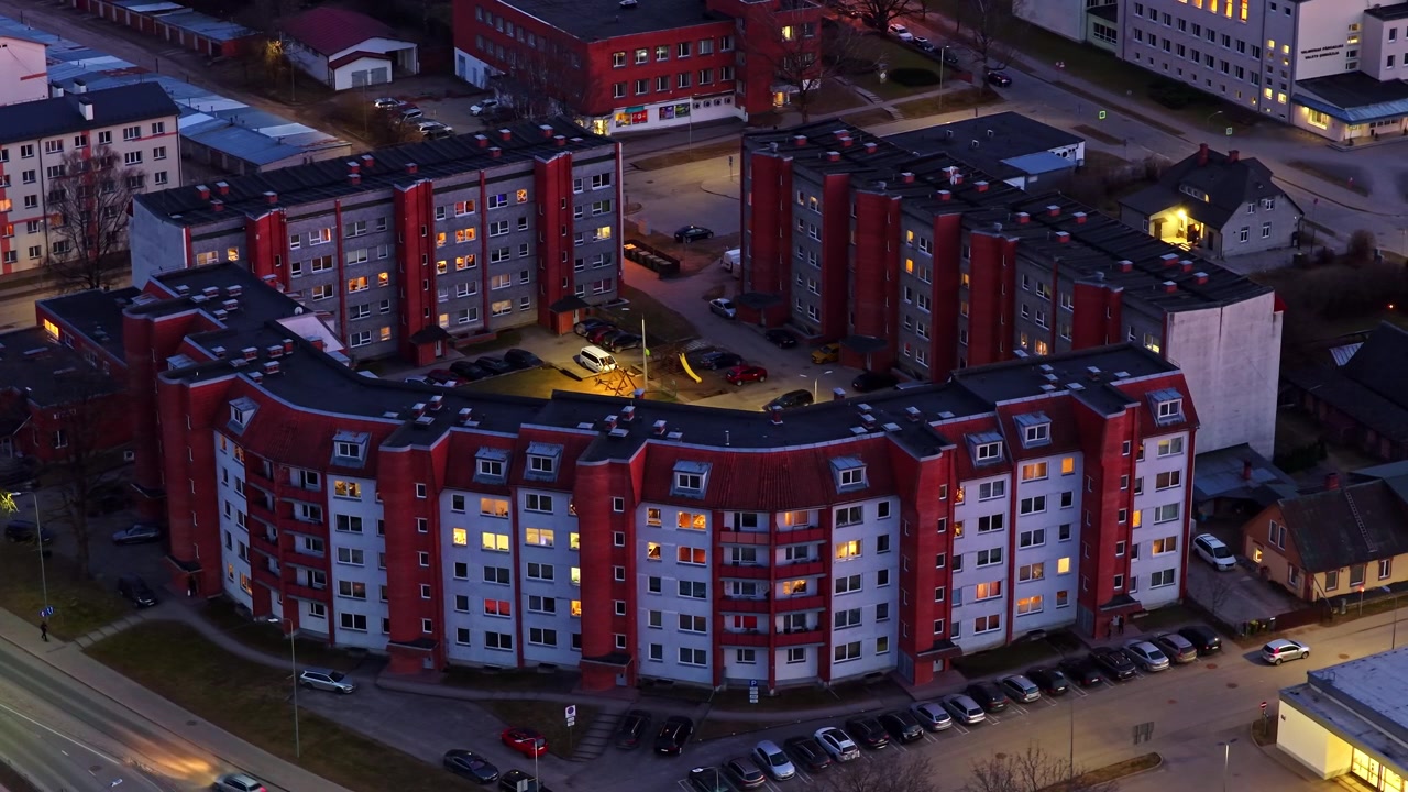 Semicircular residential building at dusk in a suburb in Eastern Europe, aerial view in Valmiera Latvia