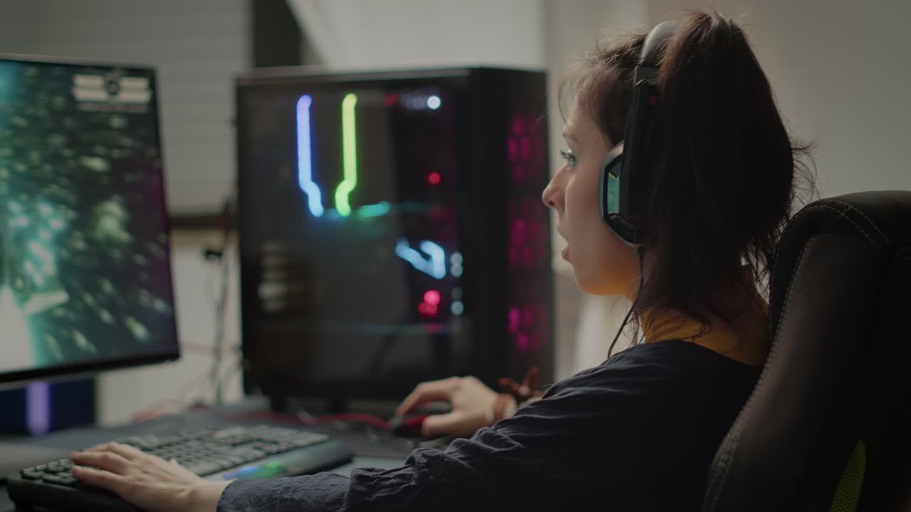 Professional eSport gamer with headset playing in competitive video games