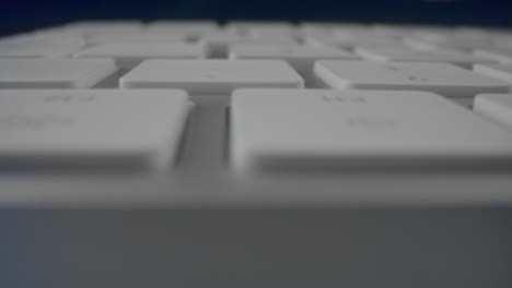 macro of modern white keyboard of computer. white computer keyboard.