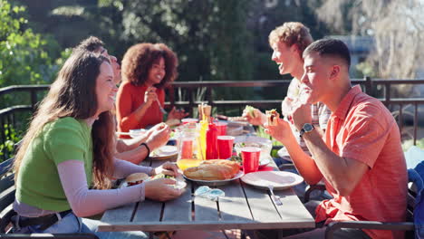 friends enjoying a picnic outdoors