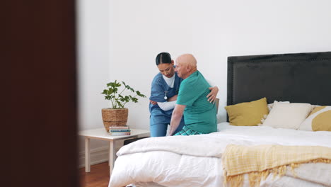 Nurse,-walking-and-helping-senior-man-from-bed