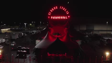 venue of paranormal cirque at night