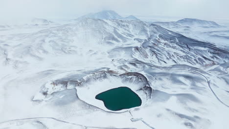 Aerial-View-Of-Krafla-Caldera-During-Winter-Season-In-Iceland---Drone-Shot