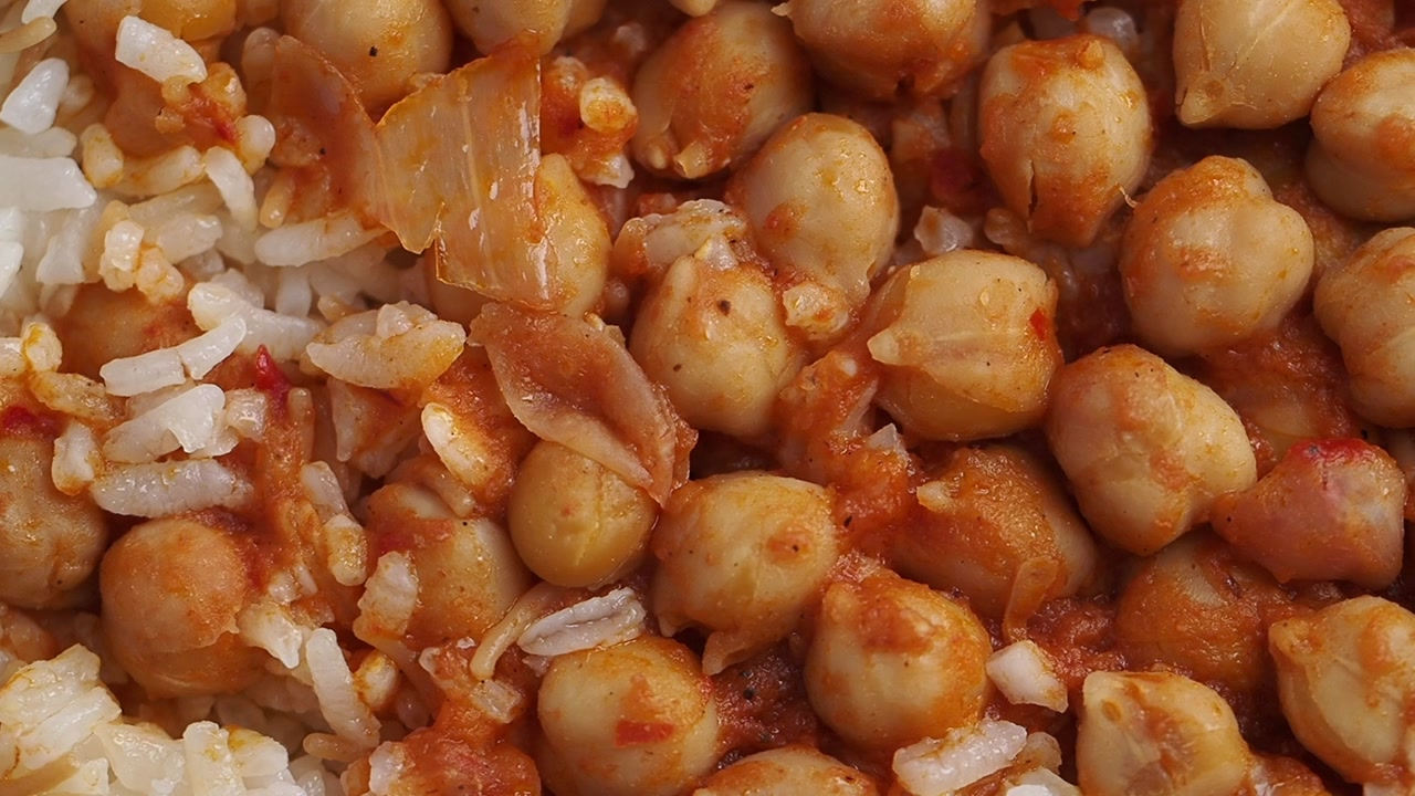 Cooked Chickpeas and Rice in a Rich Tomato Sauce