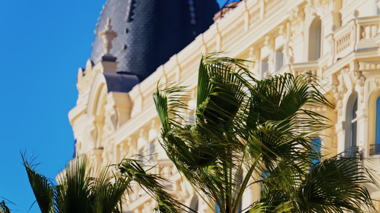 View of the Carlton Hotel on the coast in daylight. Vertical, cannes, france