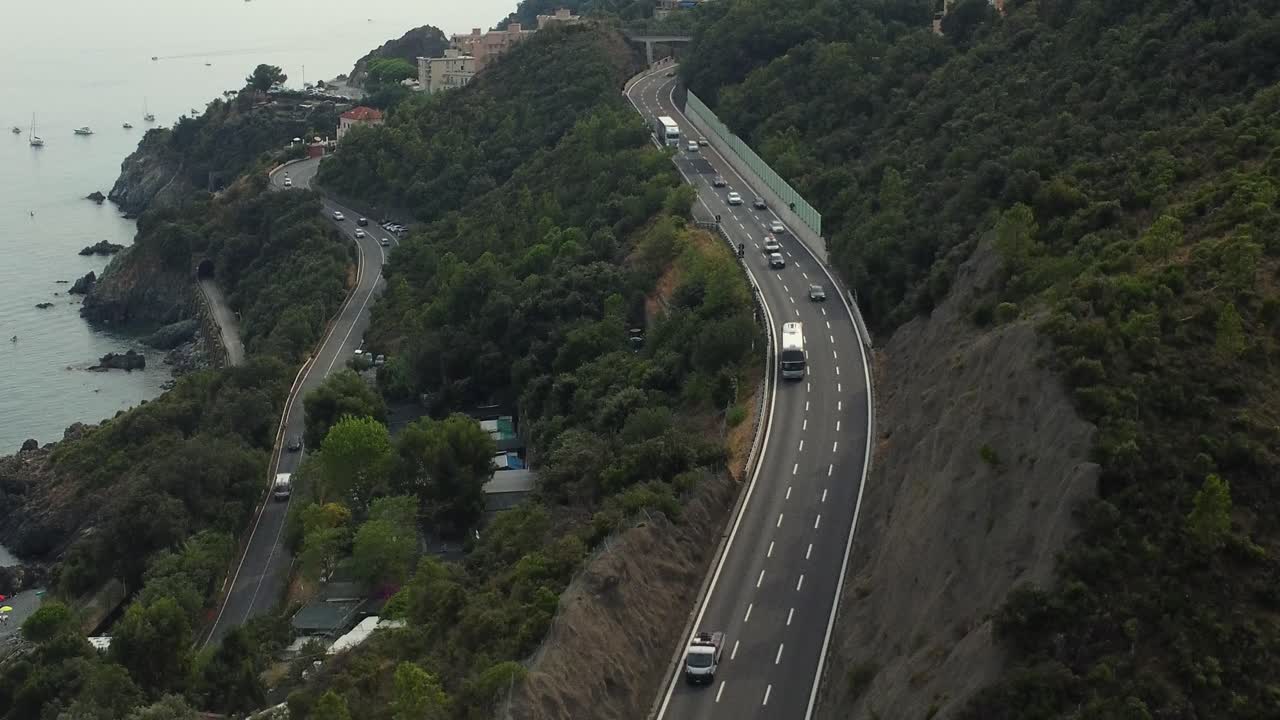 Aerial view of a coastal highway with traffic
