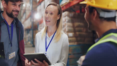 warehouse workers discussing inventory