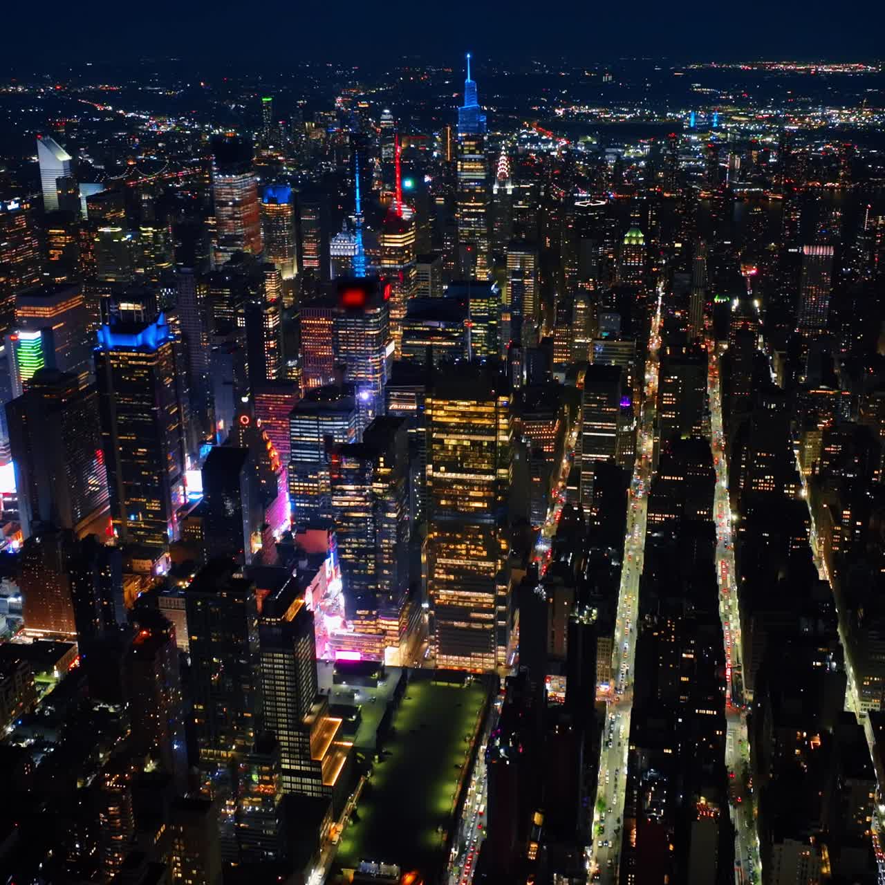 Sparkling never sleeping New York at night. Vast cityscape of metropolis from drone footage