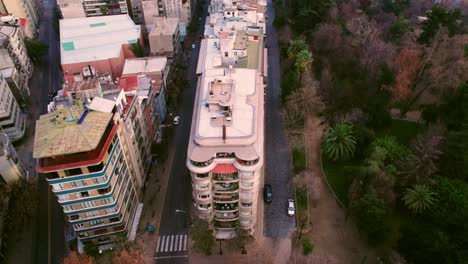 establishing shots of european-style buildings at santiago centro, forestal park