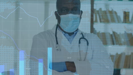 senior male doctor examining digital map and line charts in clinic wearing stethoscope