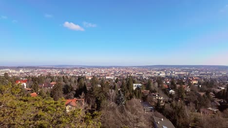 Aerial view of Sopron downtown and the surrounding neighborhoods from a distance on a sunny day in Hungary.