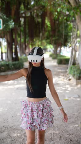 woman experiencing virtual reality in a park