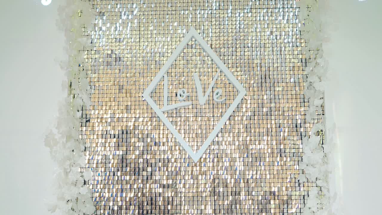 Gold glitter background. Close up view of gold glitter on wall