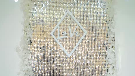 gold glitter background. close up view of gold glitter on wall