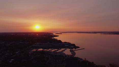 aerial red sky sunset near city waterfront view