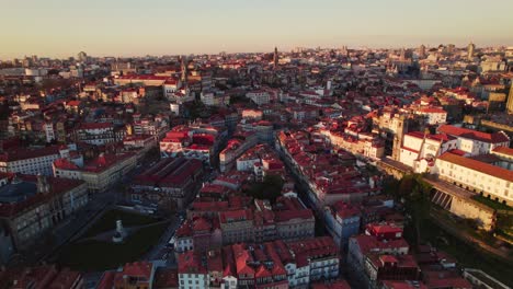 Stunning-sunset-Drone-shots-of-the-Douro-River-in-the-heart-of-Porto,-Portugal