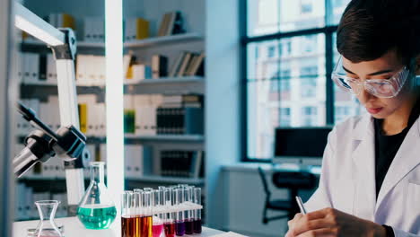 female scientist at work in modern laboratory