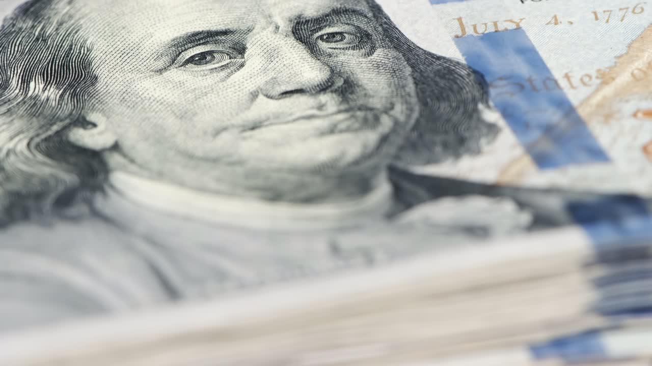 Close up currency US dollar banknotes. Income and Business concept.