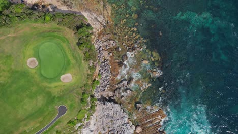 rocky shore of little bay beach in sydney, new south wales, australia - aerial top down