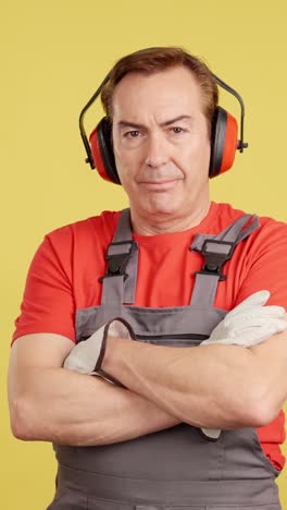 professional worker in safety gear posing confidently
