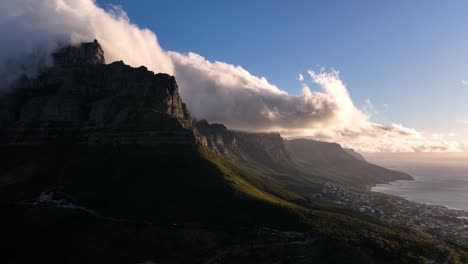 clouds enveloping the twelve apostles at sunset, cape town