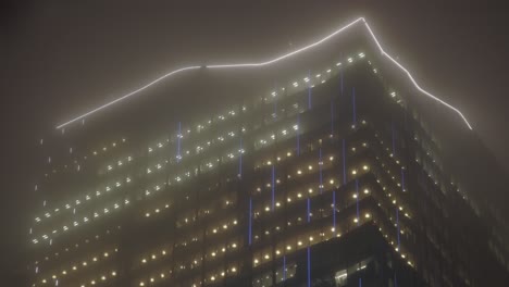 shibuya sky observation deck on scramble square building at night during rain, tokyo, japan