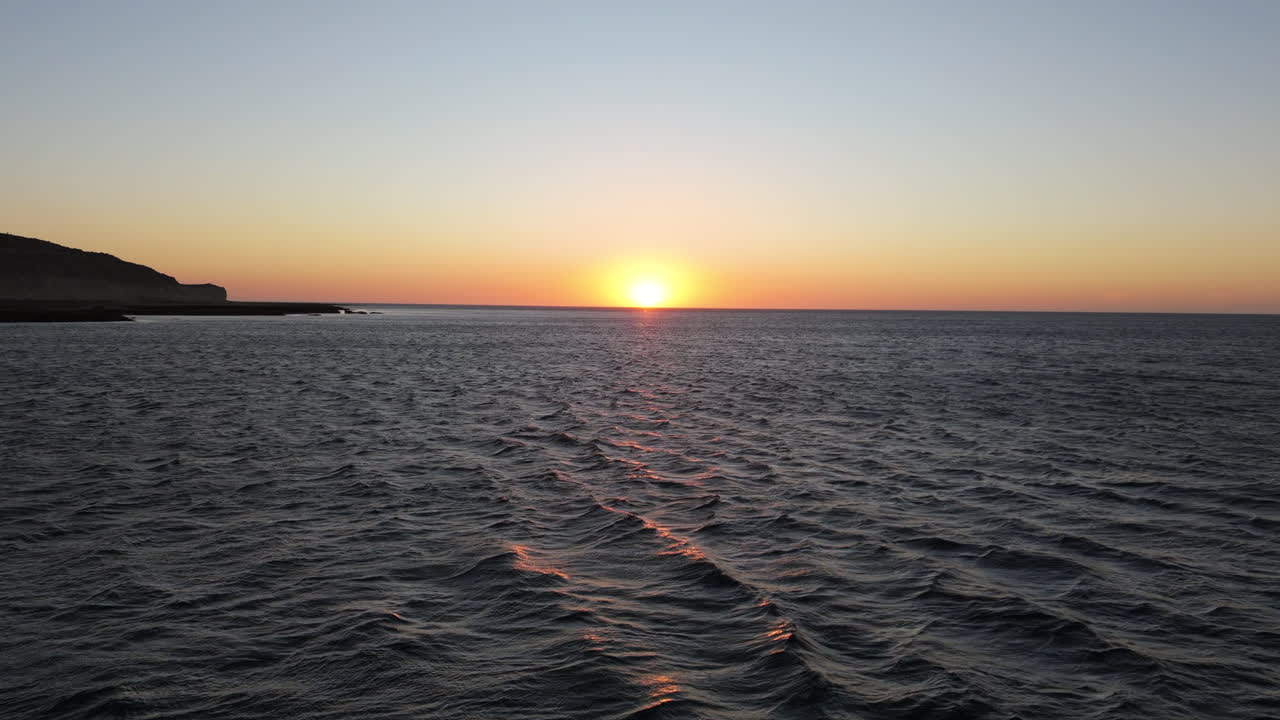 Beautiful sunrise over the ocean at Peninsula Valdes, Golfo Nuevo, Puerto Madryn, Argentina.