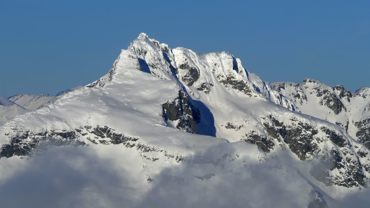 Snow-Covered Mountain Ridge Near Pemberton In British Columbia, Canada. Aerial Shot