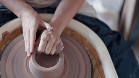 pottery, art and hands on a potter wheel