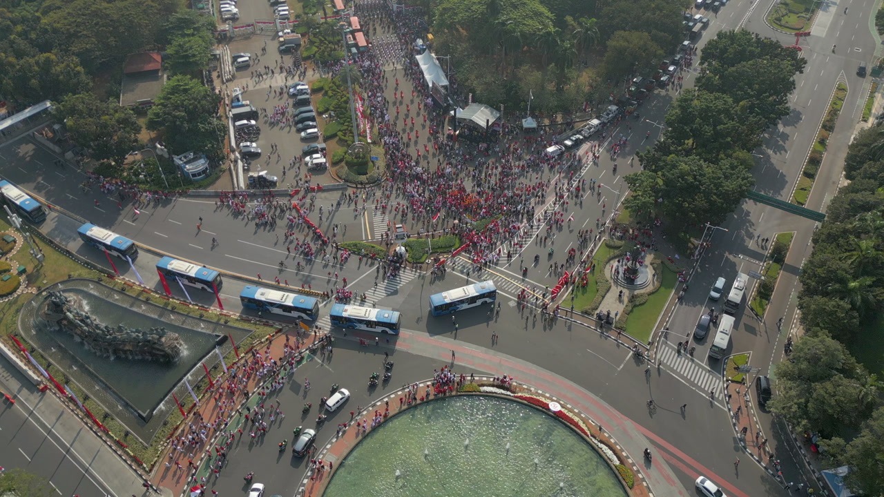 Indonesian Independence March With Horses Heads Towards Monas Jakarta Indonesia Drone Track Back 4K 60FPS