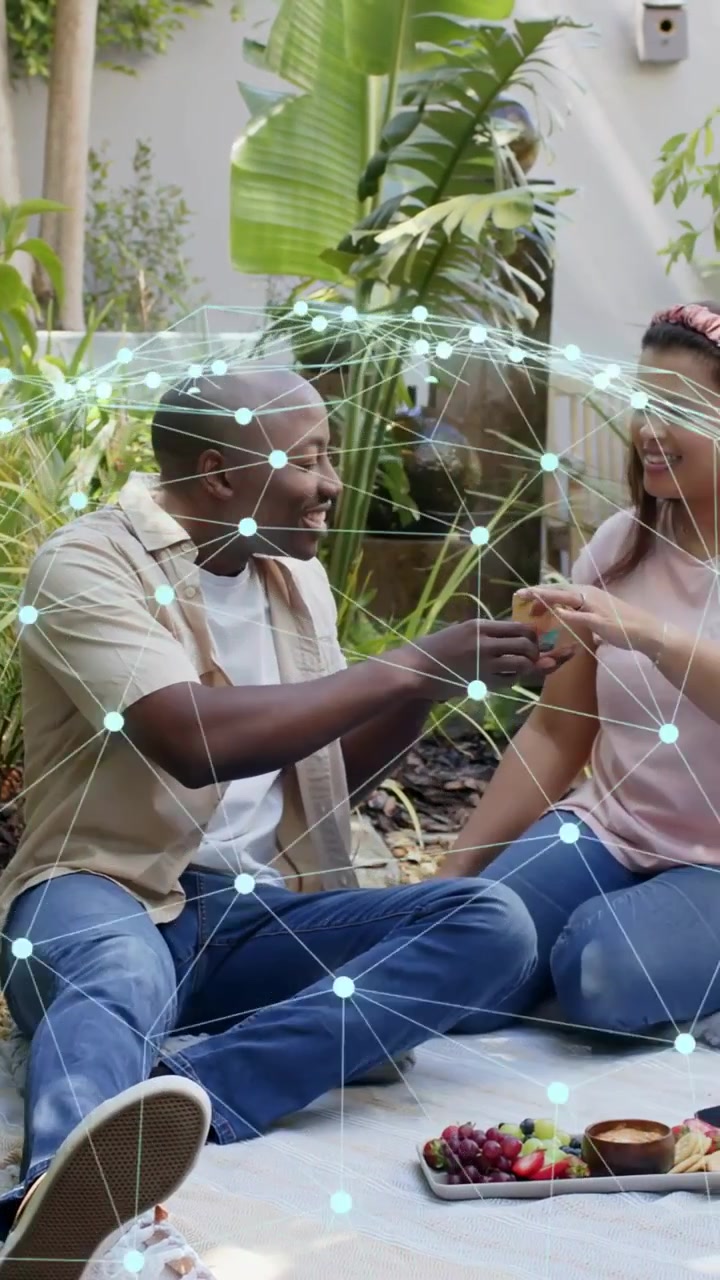 Vertical video: Man turning giving ring, couple bonding on mat while tech net arching around couple