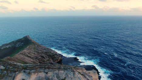 Drone-flying-over-a-mountain-to-reveal-beautiful-tide-pools